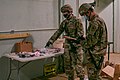 Soldiers of the 203rd training to analyze a suspected bomb making laboratory.