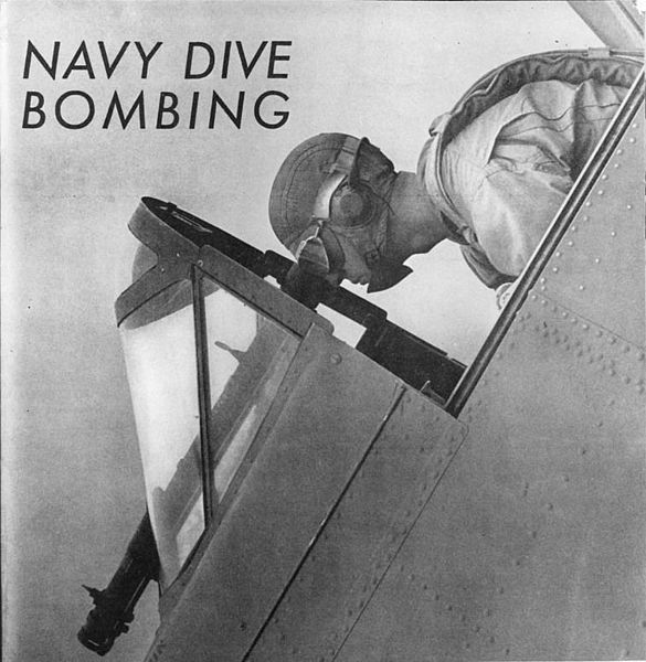 US Navy dive bomber pilot flying the airplane at an angle of about 75°.