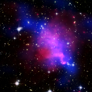 False color image of the galaxy cluster.  (Orientation: north up, east left.) The distribution of dark matter is shown in blue, while the red areas indicate the regions of increased baryonic density.