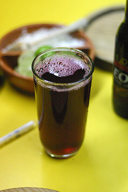 A glass of cold agua de flor de Jamaica in a Cuernavaca restaurant