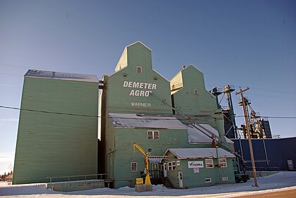 1918 Alberta Pacific elevator (right) and 1968 Federal Grain elevator Alberta Pacific Grain Co. & Federal grain Co. elevator (TWIN) - Warner.jpg