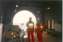 Mike Turner (left) and Wally Michalski (right) inside the French Portal in October 1993 with two Saracen Sahara bicycles they had ridden from the UK construction site At French Portal.jpeg