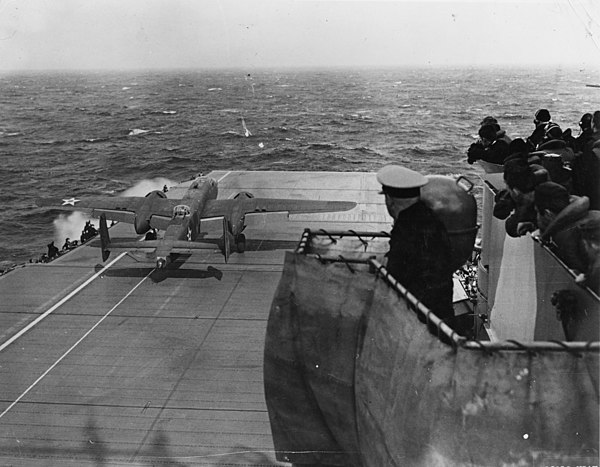 Jimmy Doolittle and his B-25 Mitchell prior to taking off from the USS Hornet for the raid