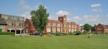 Main school building in the centre, with the English, Drama and Music block and the Language block to the right of the photo; Sixth Form block and Science Quadrant to the left Bablake summer 2007.jpg
