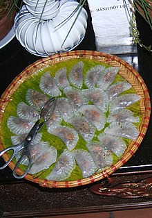 Bánh bột lọc trần containing shrimp, ground pork, and mushrooms