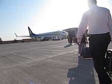 Boarding a Jet Airways flight at Jodhpur Airport.JPG