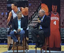 Brett Brown is interviewed at a 76ers fan meet and greet in 2014 Brett Brown 2014.jpg