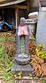 Statue at the Zeniarai Benzaiten Ugafuku Shrine.