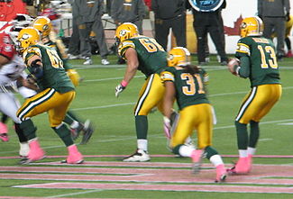 Calvin McCarty (#31) in a 2013 game against the Calgary Stampeders Calvin McCarty 18 October 2013.JPG