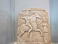 Thracian rider of "Scythian" type, with raised hand, riding towards female figure, Madara Museum, Bulgaria