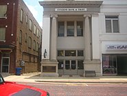 Citizens Bank, built as Webster Bank in 1910, was renovated and reopened in 2001 at 704 Main Street in Minden next to Clyde Stanley's Karate School. Built in Ionic style, the bank is listed on the National Register of Historic Places.