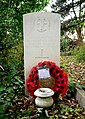 A Commonwealth War Graves Commission gravestone for the First World War in the churchyard of Saint John the Evangelist in Sidcup.