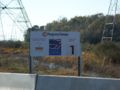 Schild an der Einfahrt des Kernkraftwerks