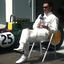 Franchitti in the pit lane of the Silverstone Circuit at the 2014 British Grand Prix. Dario Franchitti Silverstone 2014.JPG