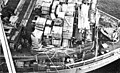 Flight deck of USS Glacier loaded with equipment transferred from USS Wyandot for transportation to Hut Point.