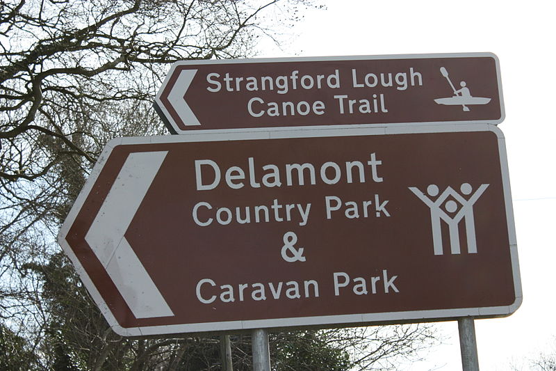 File:Delamont road sign, April 2010.JPG