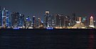 Doha West Bay skyline by night (cropped).jpg