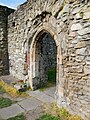 Doorway on the western side of the courtyard at Lesnes Abbey in Abbey Wood. [75]