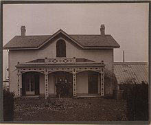 1906 photo of Alexander Graham Bell at his home in nearby Brantford. Hamilton was home to the British Empire's first telephone exchange. Dr Bell and party at the home of the telephone (HS85-10-17080).jpg