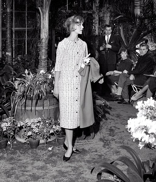 Finnish actress Elina Salo presenting clothes designed by Vuokko Nurmesniemi at a fashion show in the Helsinki Botanical Garden in 1958