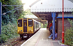 Een pendeltrein van Network South East in 1991 in het station.