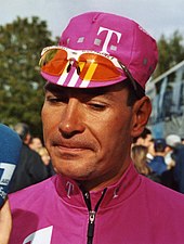 Portrait of Erik Zabel wearing a pink jersey and cap