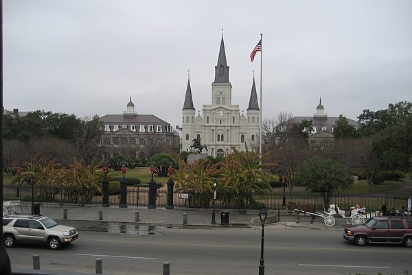 The Cabildo is left of St. Louis Cathedral at Jackson Square.