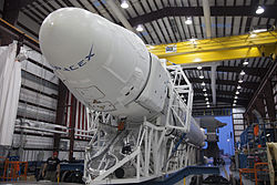 Falcon 9 in SLC-40 hangar before roll-out - CRS-2 (KSC-2013-1676)