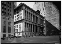 Black-and-white image of the building as seen from Wall Street and Hanover Street