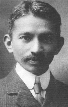 Gandhi in the early 20th century, when he stayed at the hotel Gandhi suit (cropped).jpg