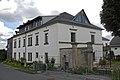 Residential house, attached side building, barn, stable building and courtyard wall with gate entrance and gate of a four-sided courtyard