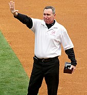 Gene Monahan, an athletic trainer for the New York Yankees waves to the crowd at Yankee Stadium after receiving his 2009 World Series ring Gene Monahan 2010 CROPPED.jpg