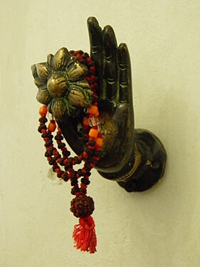 Indian hook hanger made of bronze, rudraksha beads.