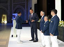 Ilham Aliyev met with athletes who competed in 30th Summer Olympic Games (Ilham Aliyev and Emin Ahmadov).jpg