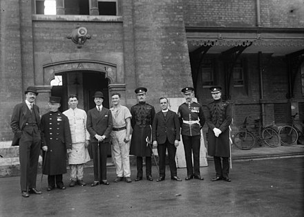 Members of the Irish Guards, pictured here sometime before 1914. Alexander, wearing civilian clothes, is stood fourth on the left.