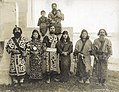 "Japanese_Ainu_group_of_four_men_and_two_women_(standing)_with_seated_young_boy_and_man_holding_a_baby_in_the_Department_of_Anthropology_exhibit_at_the_1904_World's_Fair.jpg" by User:Fæ