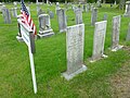 A group of gravestones for the King Family. Located at King and Williams Cemetery, immediately north of the intersection of South Street East and Pine Street Lane, Raynham, Massachusetts.