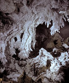 Gypsum stalactites in a cave formed via sulfuric acid dissolution (Lechuguilla Cave, New Mexico) Lechuguilla Chandelier Ballroom.jpg