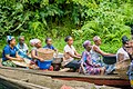 Local women in Badagry traveling on canoe