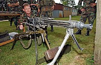 MG 3 in the heavy machine gun setup on a Feldlafette tripod with mounted optical sight