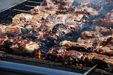 Chicken kebabs being barbecued Maker Faire 2008 San Mateo 66.JPG