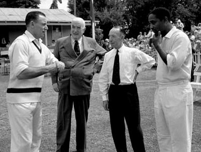 Left to right: Ray Lindwall, Australian Prime Minister Robert Menzies, Lindsay Hassett, Frank Worrell.