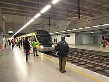 Porto Metro train. Metro do Porto - Estacao Trindade (8232694389).jpg