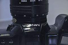 Minolta Dynax 7000i Analogue Film Camera, With Sigma 28-70mm Lens (8744284628).jpg