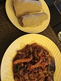 Thumbnail for File:Mutton tibs and injera.jpg