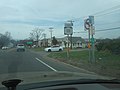 NY 111 is about to end, but not at this bus stop for the Suffolk County Transit S45 bus.