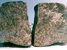 Nakhla meteorite's two halves, showing its inner surfaces after being broken in 1998 Nakhla meteorite.jpg