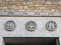 Reliefs above doorway