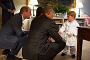 2016: President Barack Obama with First Lady Michelle Obama meets Prince George