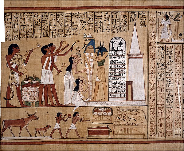 Priests of Anubis, the guide of the dead and the god of tombs and embalming, perform the opening of the mouth ritual